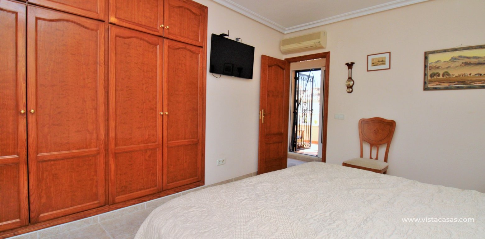 Detached villa with private pool for sale in Zodiaco VI Villamartin master bedroom fitted wardrobes