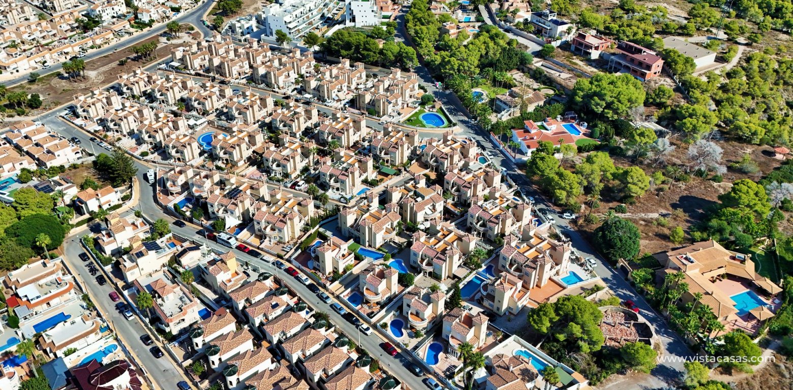 Detached villa with private pool for sale in Zodiaco VI Villamartin aerial view