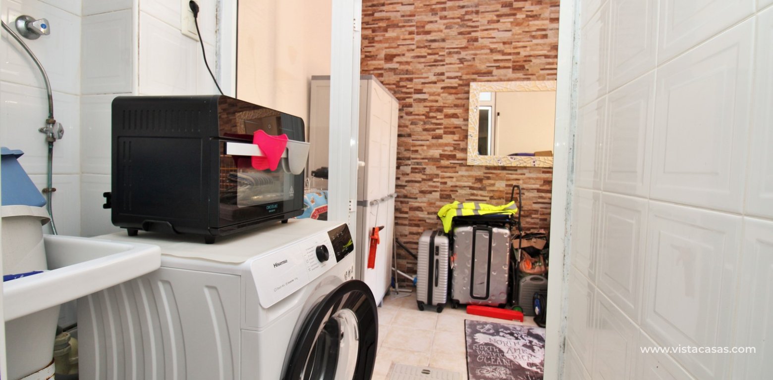 3 bedroom quad with sea views in Vista Azul Villamartin utility room