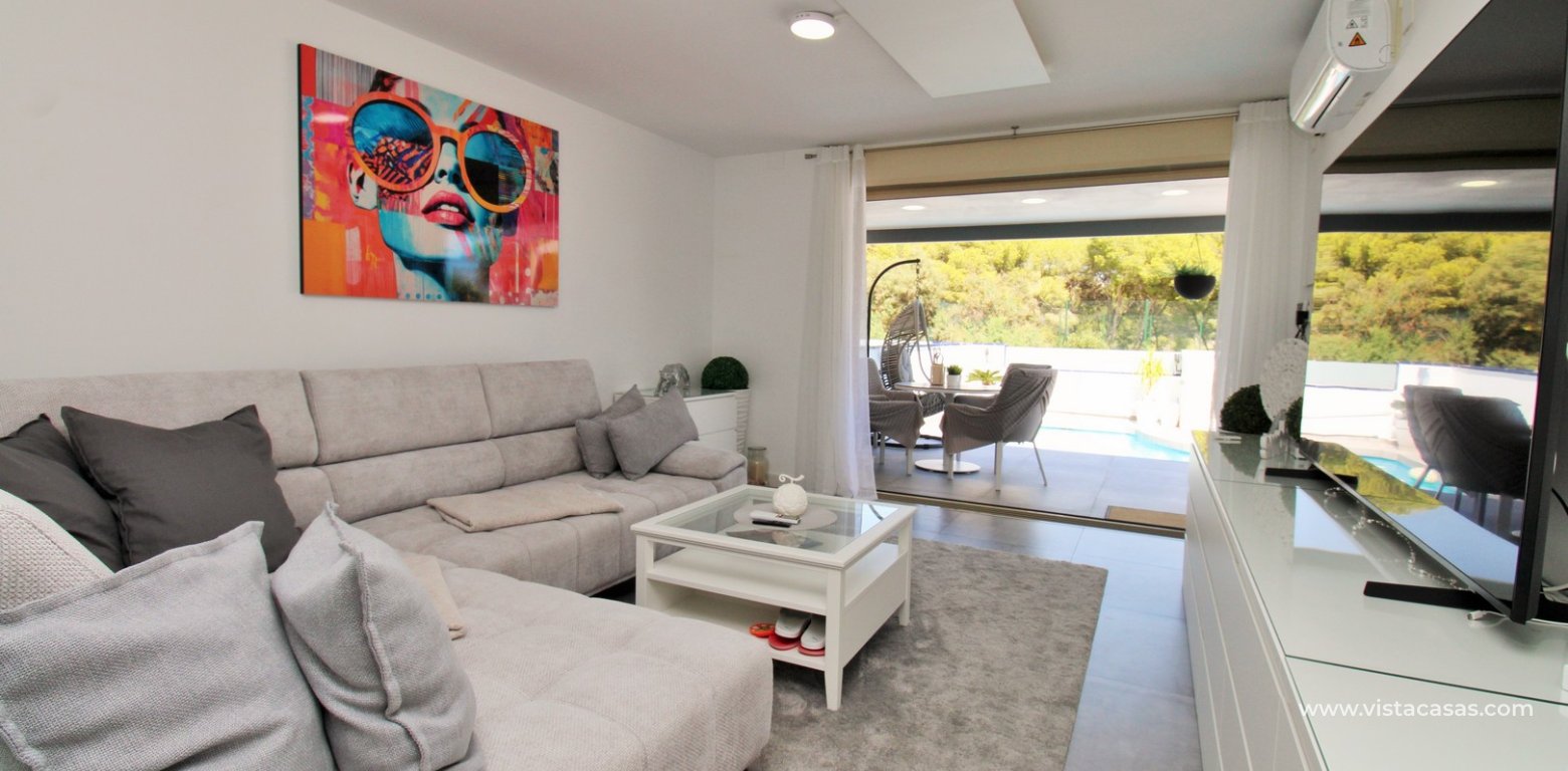 Beachside semi-detached house for sale in Mil Palmeras with private swimming pool lounge 3
