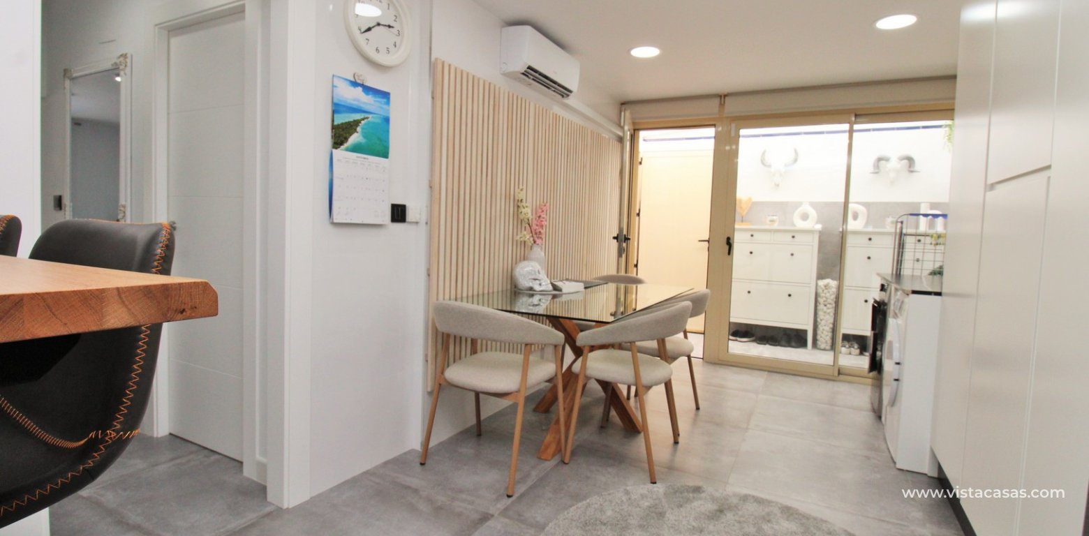 Beachside semi-detached house for sale in Mil Palmeras with private swimming pool dining area