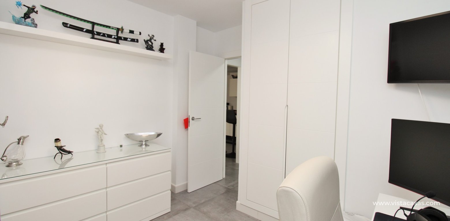 Beachside semi-detached house for sale in Mil Palmeras with private swimming pool downstairs bedroom fitted wardrobes
