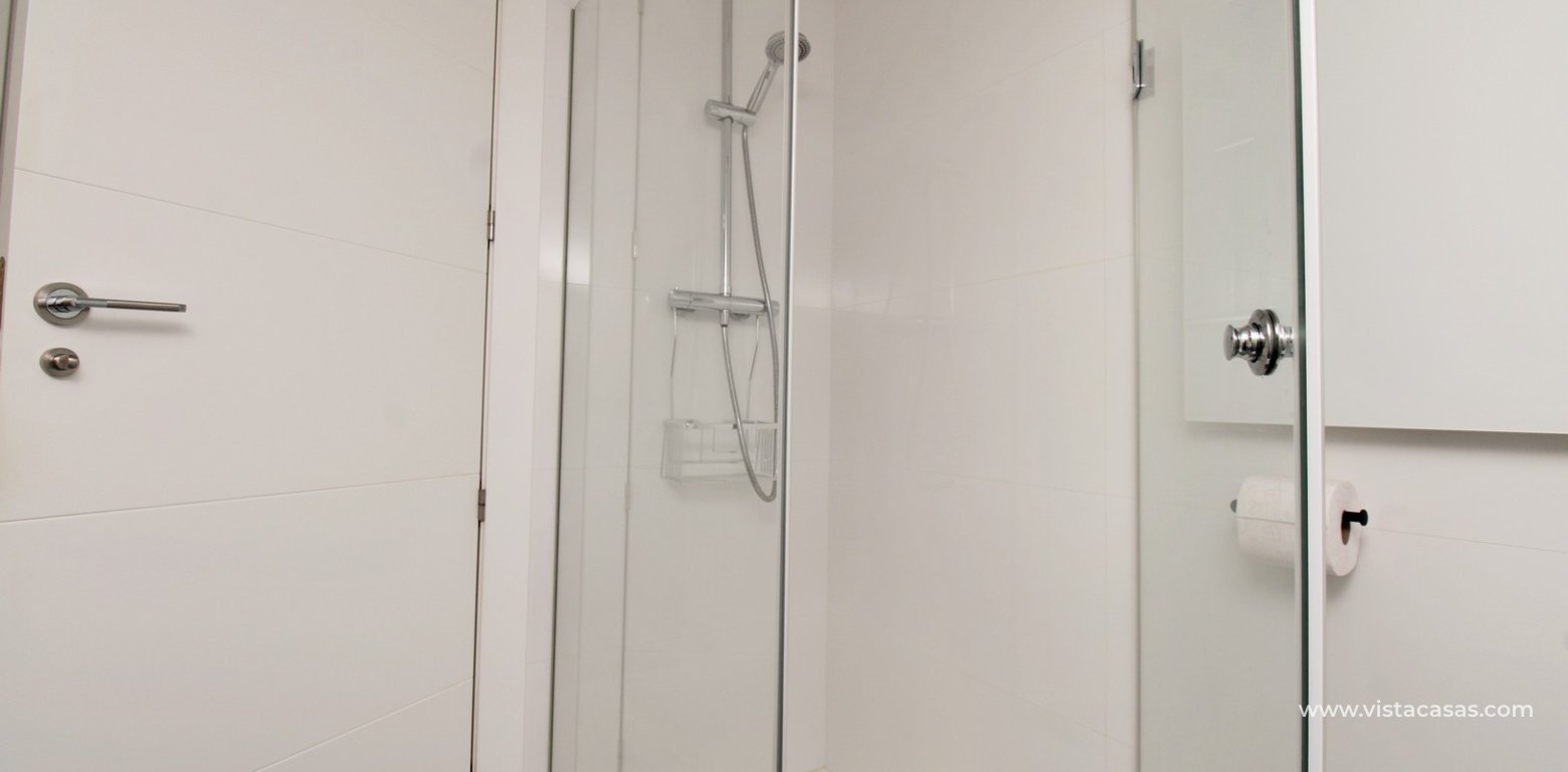 Beachside semi-detached house for sale in Mil Palmeras with private swimming pool downstairs bathroom walk-in shower
