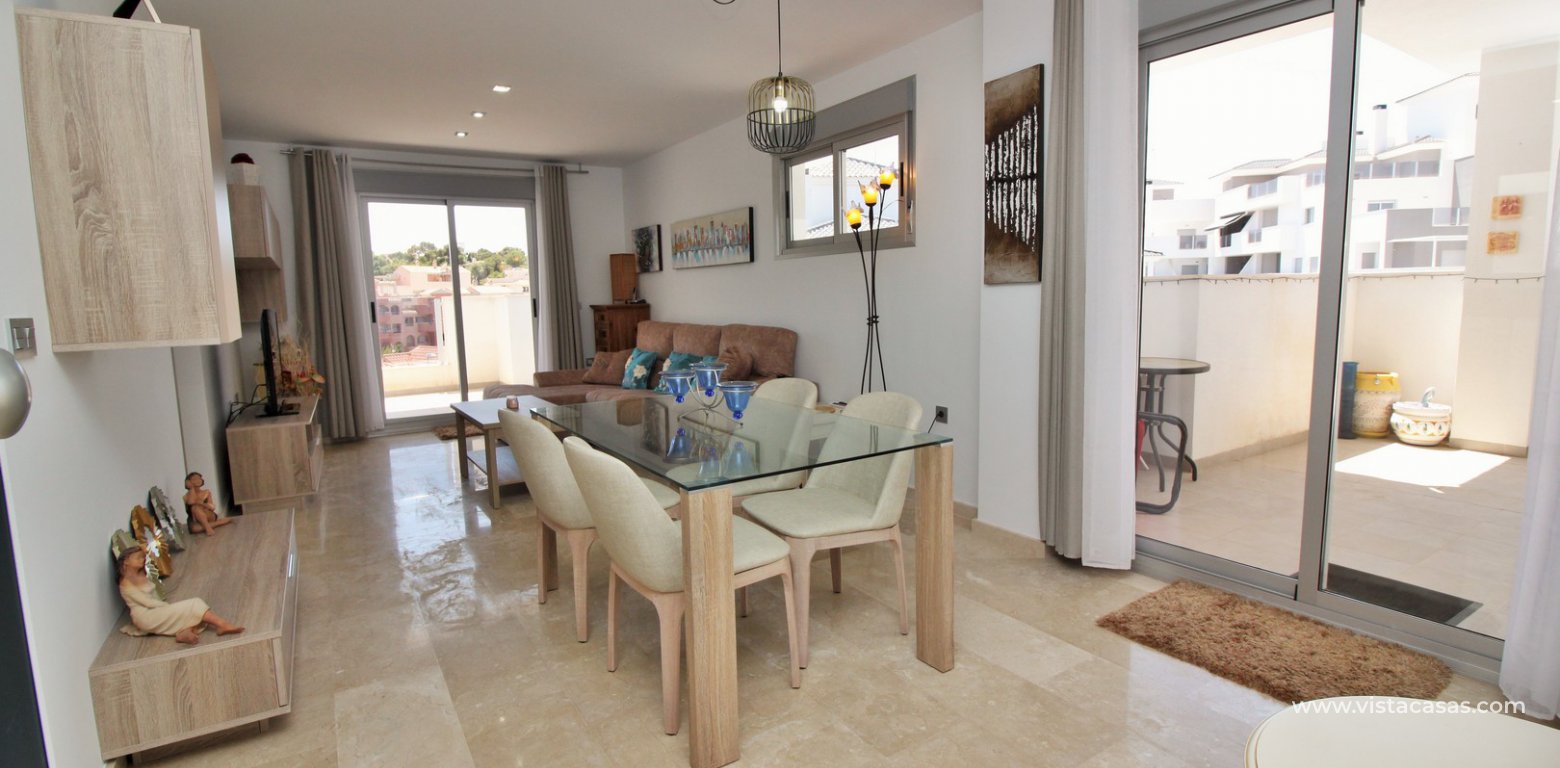 Penthouse apartment for sale in Sungolf Beach Villamartin dining lounge area
