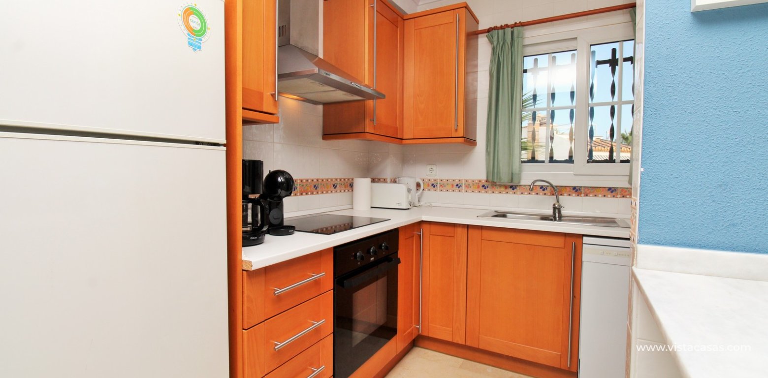Top floor apartment with sea and pool views in for sale in Las Violetas Villamartin kitchen 2
