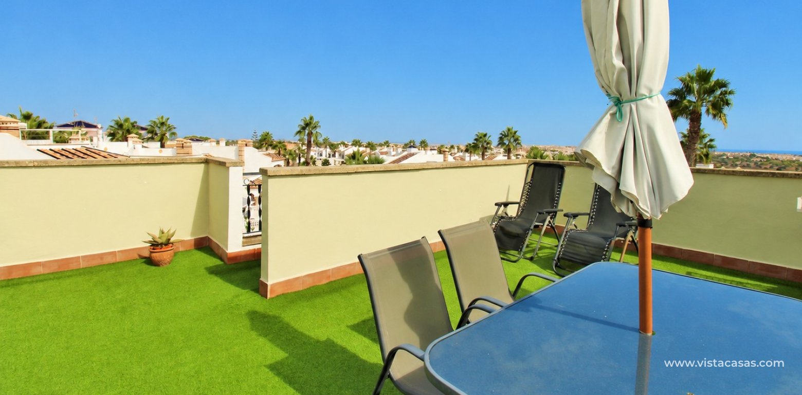 Top floor apartment with sea and pool views in for sale in Las Violetas Villamartin roof terrace