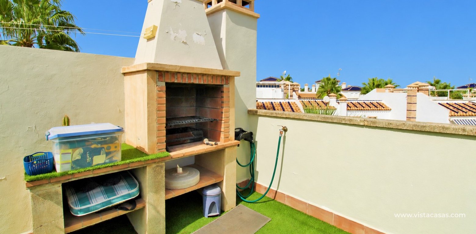 Top floor apartment with sea and pool views in for sale in Las Violetas Villamartin bbq