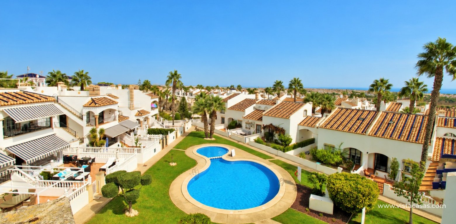 Top floor apartment with sea and pool views in for sale in Las Violetas Villamartin solarium pool view