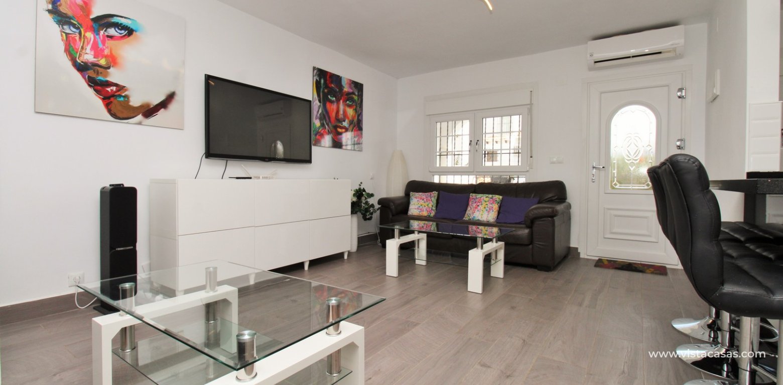 ully renovated 3 bedroom Buhardilla townhouse for sale in Verdemar III Villamartin lounge 4