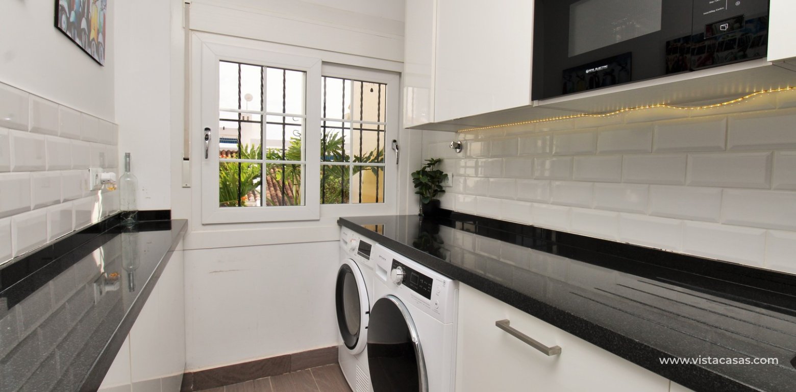 ully renovated 3 bedroom Buhardilla townhouse for sale in Verdemar III Villamartin utility area