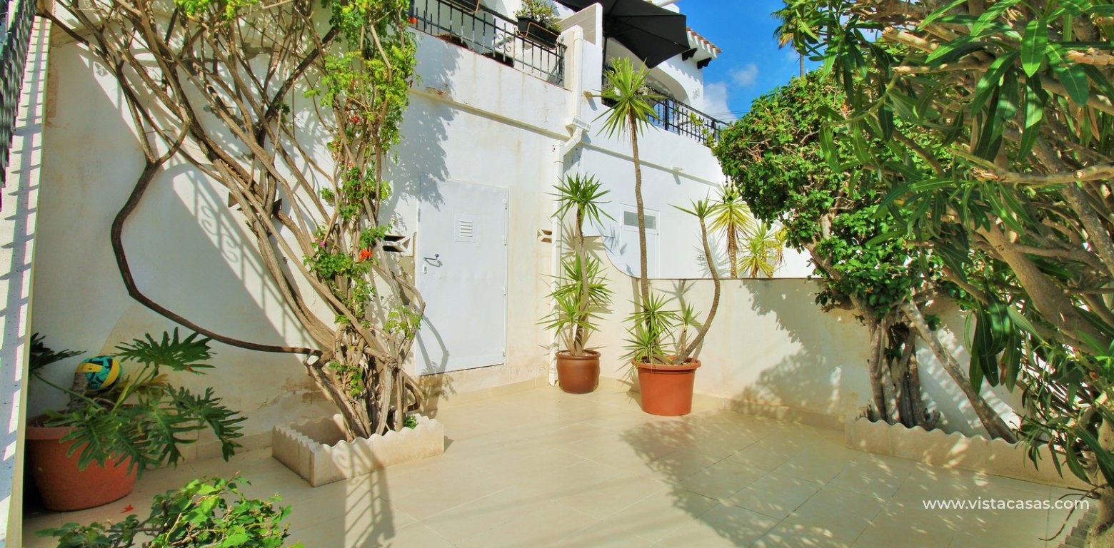 ully renovated 3 bedroom Buhardilla townhouse for sale in Verdemar III Villamartin front garden