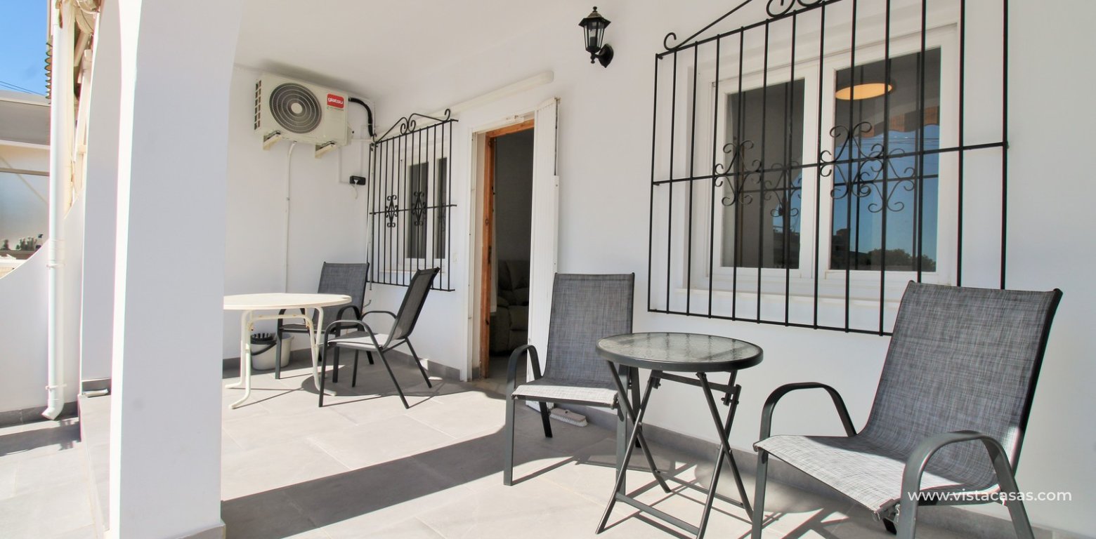 South-facing 2-bedroom bungalow for sale in Villamartin near La Fuente porch