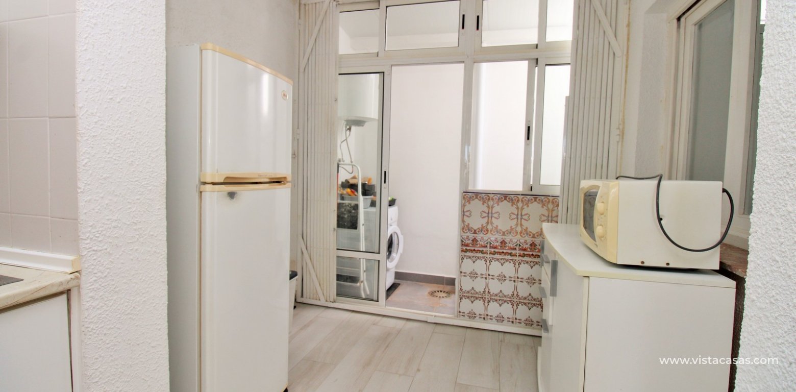 South-facing 2-bedroom bungalow for sale in Villamartin near La Fuente utility room