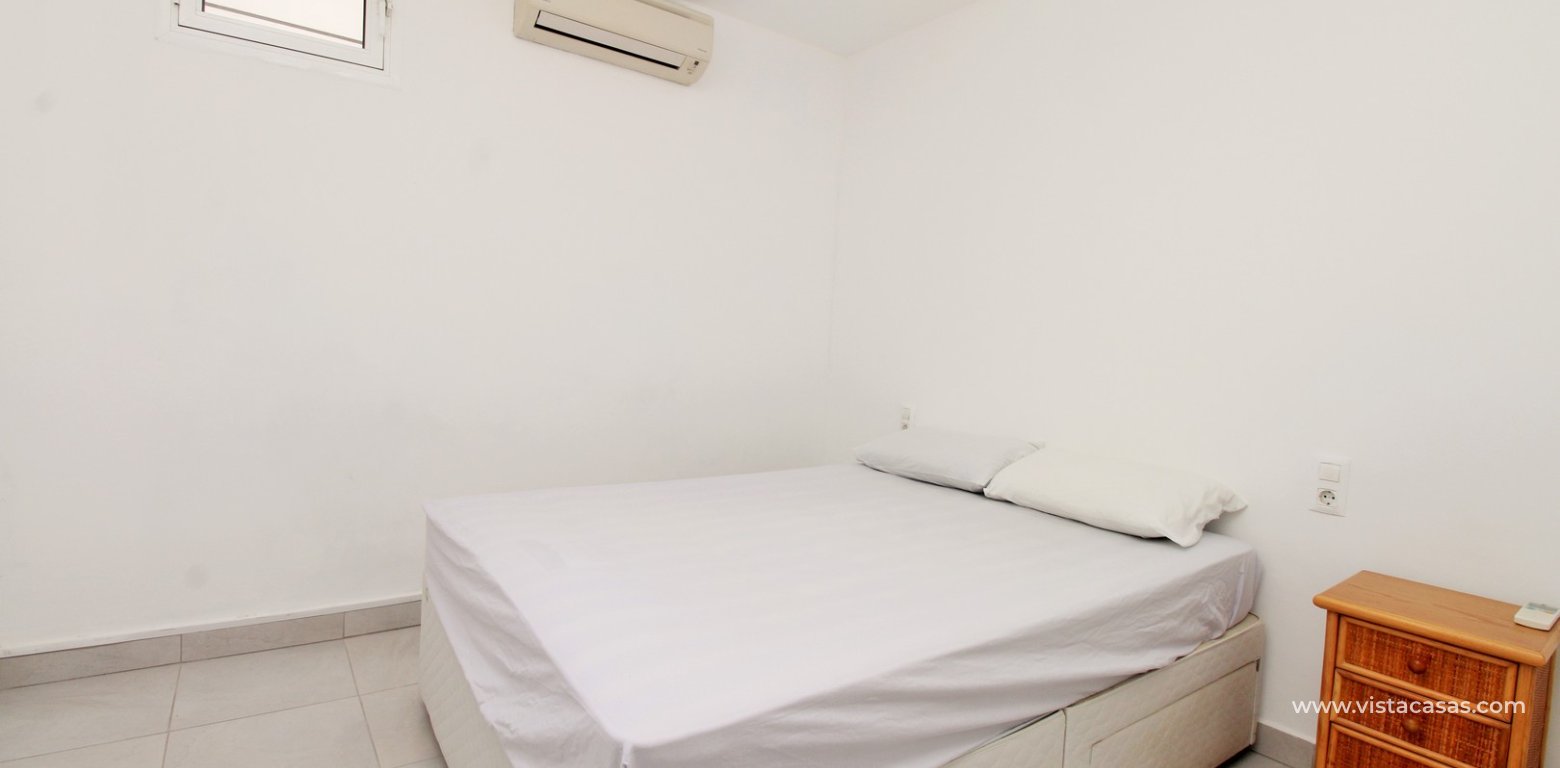 South-facing 2-bedroom bungalow for sale in Villamartin near La Fuente master bedroom