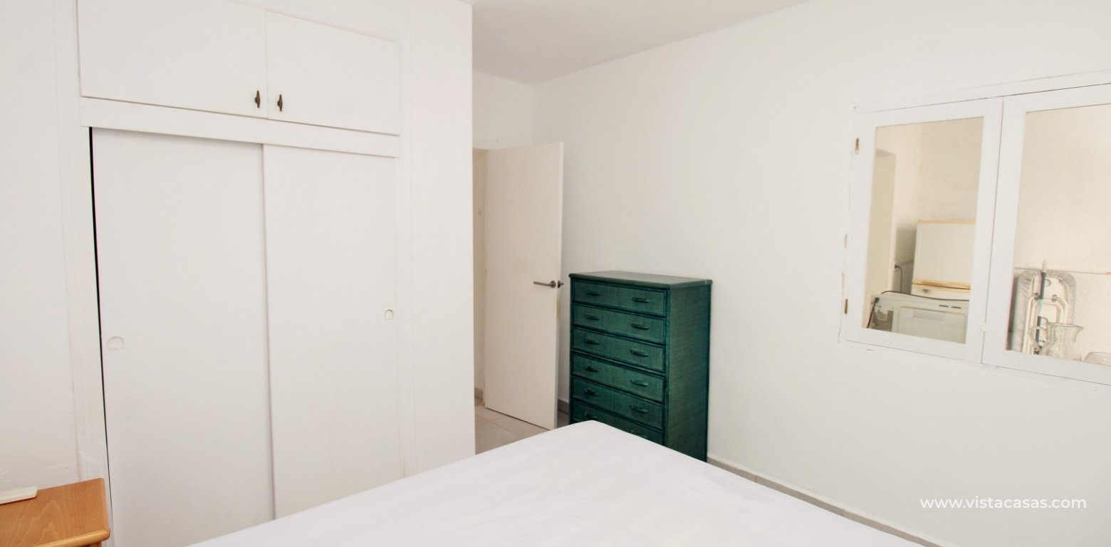 South-facing 2-bedroom bungalow for sale in Villamartin near La Fuente master bedroom fitted wardrobes