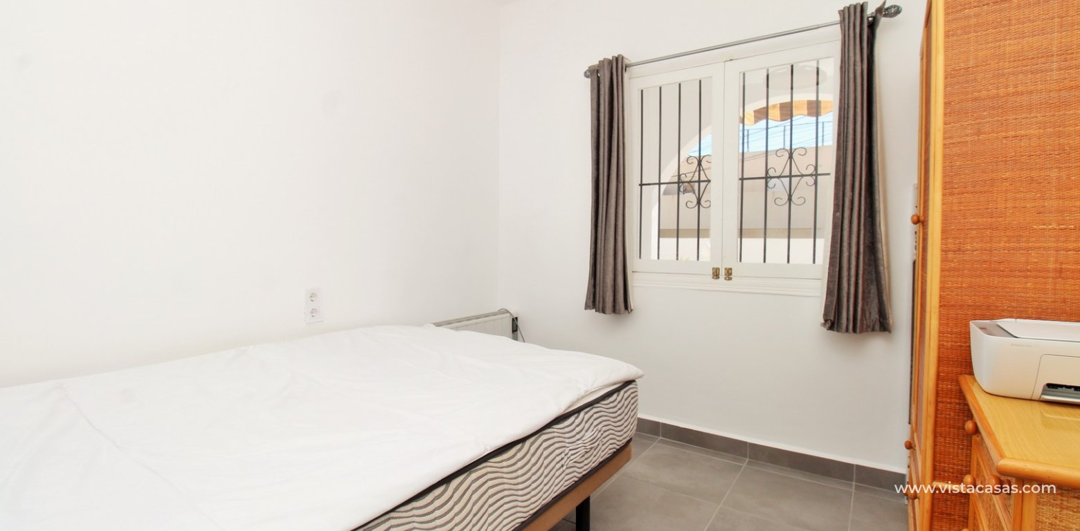 South-facing 2-bedroom bungalow for sale in Villamartin near La Fuente double bedroom