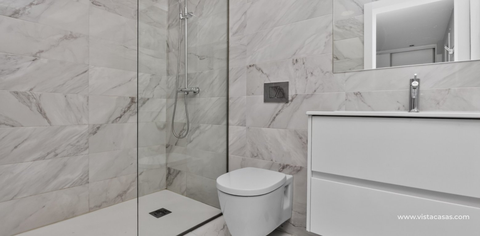 South-facing 4 bedroom villa for sale in Pink Paradise Villamartin underbuild en-suite bathroom