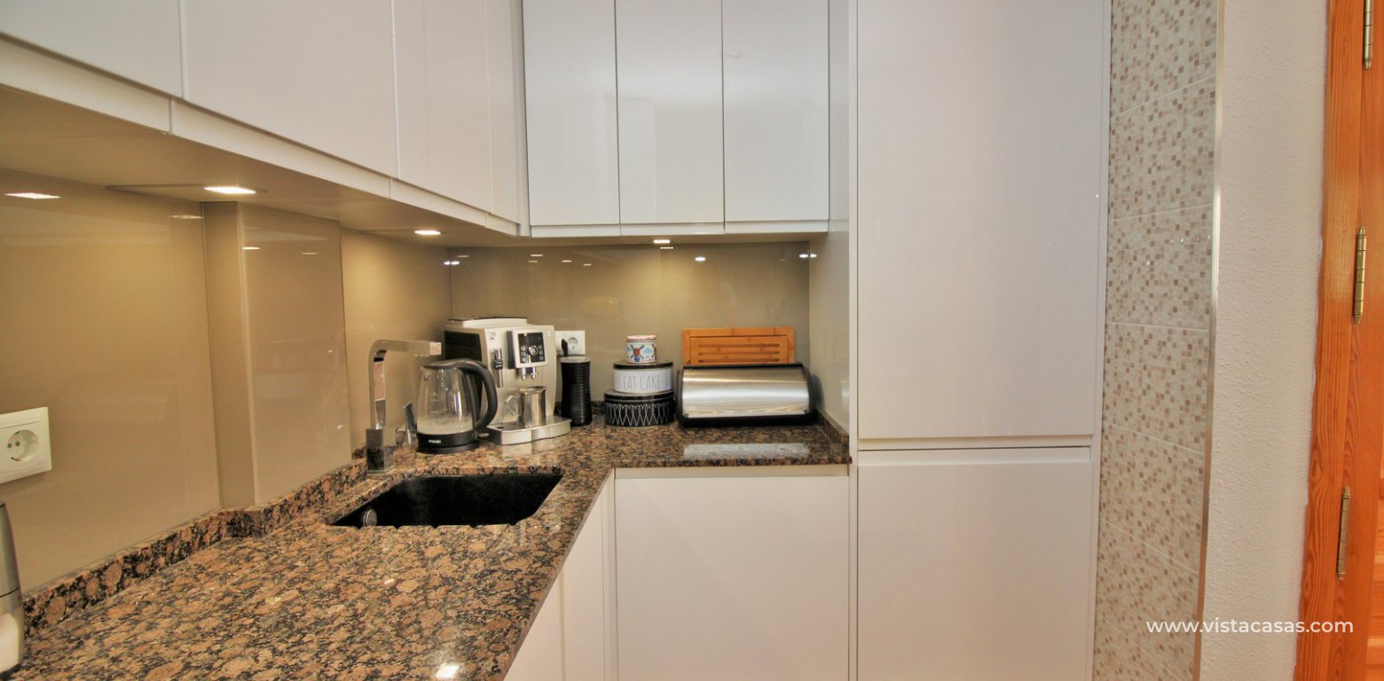 Modern top floor apartment for sale in Panorama Golf Villamartin kitchen 3