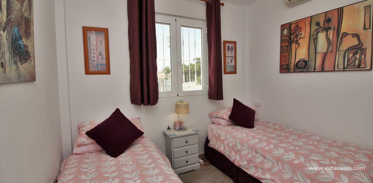 Modern top floor apartment for sale in Panorama Golf Villamartin twin bedroom