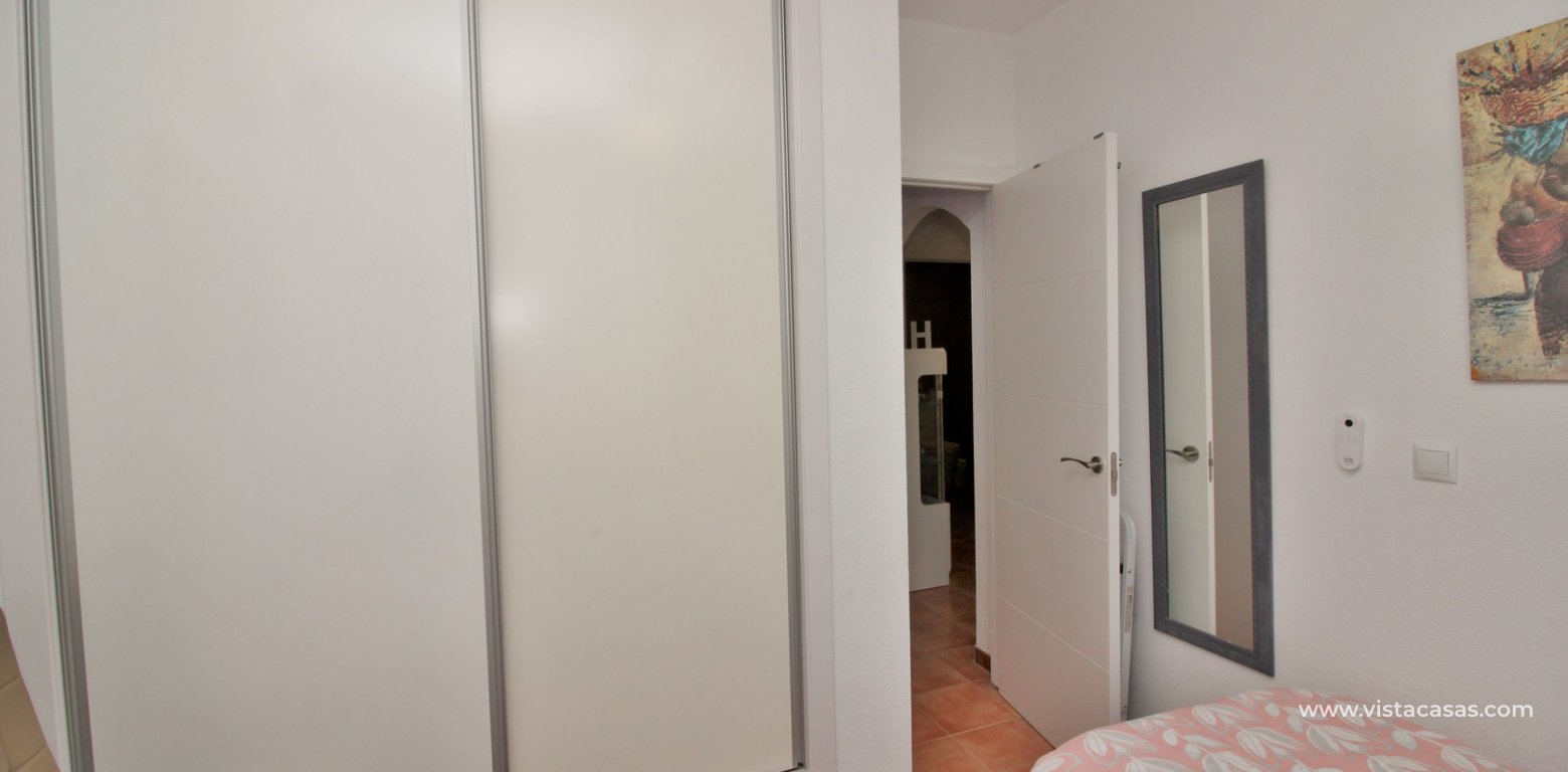 Modern top floor apartment for sale in Panorama Golf Villamartin twin bedroom fitted wardrobes