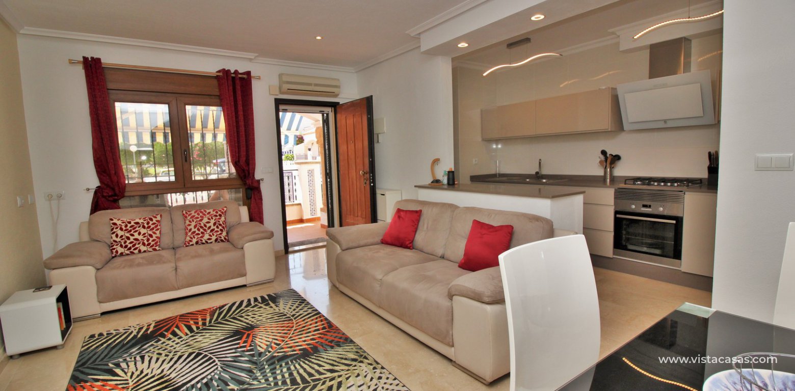 Buhardilla townhouse for sale in Pau 8 Villamartin Las Mariposas lounge 3