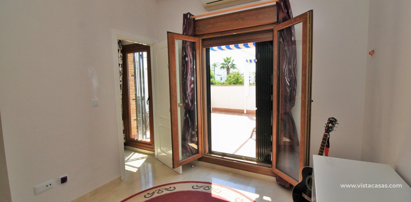 Buhardilla townhouse for sale in Pau 8 Villamartin Las Mariposas master bedroom solarium