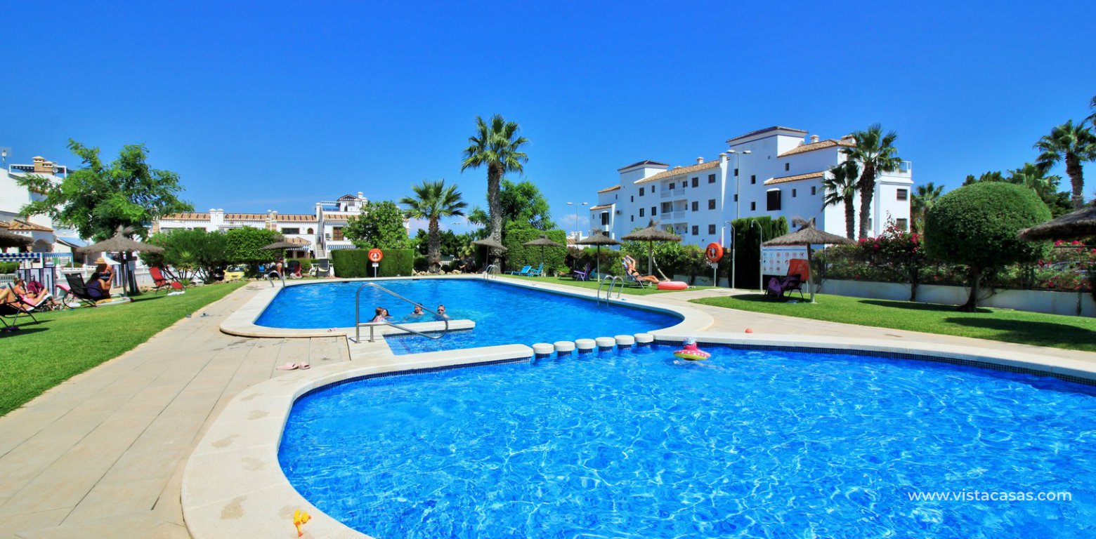 Buhardilla townhouse for sale in Pau 8 Villamartin Las Mariposas swimming pool