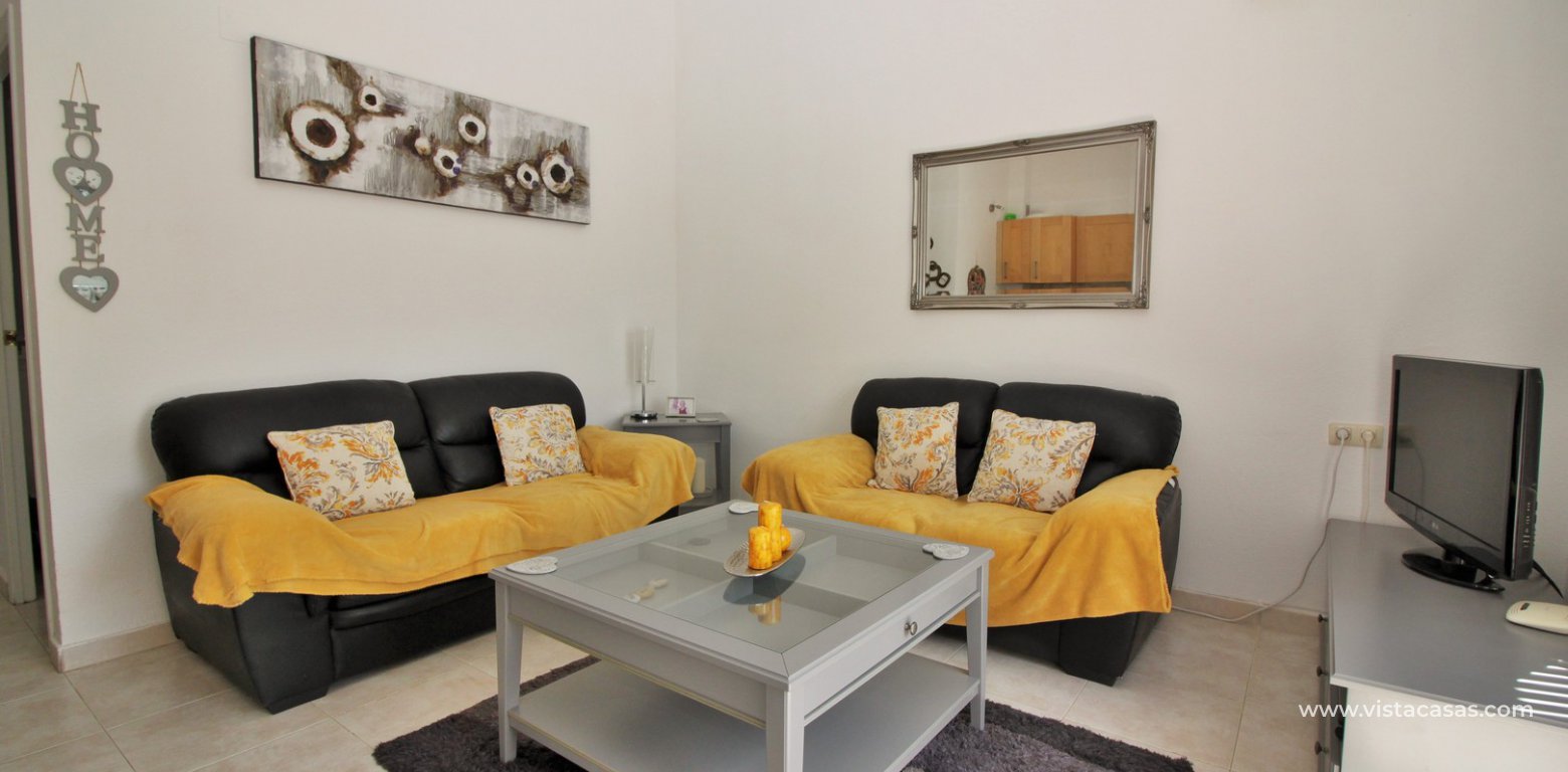 South facing apartment for sale Lomas del Golf Villamartin overlooking the pool lounge 3