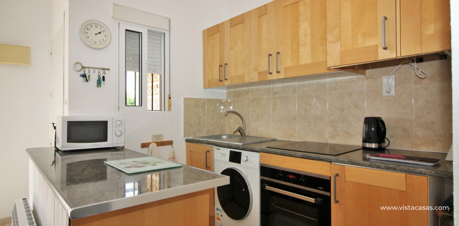 South facing apartment for sale Lomas del Golf Villamartin overlooking the pool kitchen 2