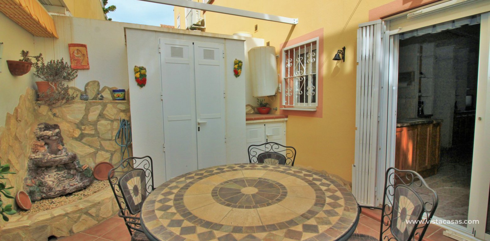 Townhouse for sale in Bosque de las Lomas Villamartin rear terrace 2