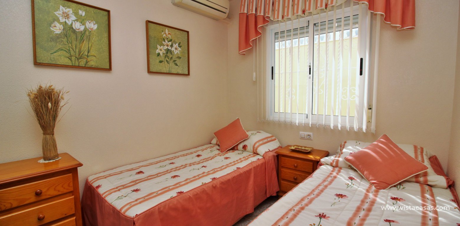 Townhouse for sale in Bosque de las Lomas Villamartin twin bedroom