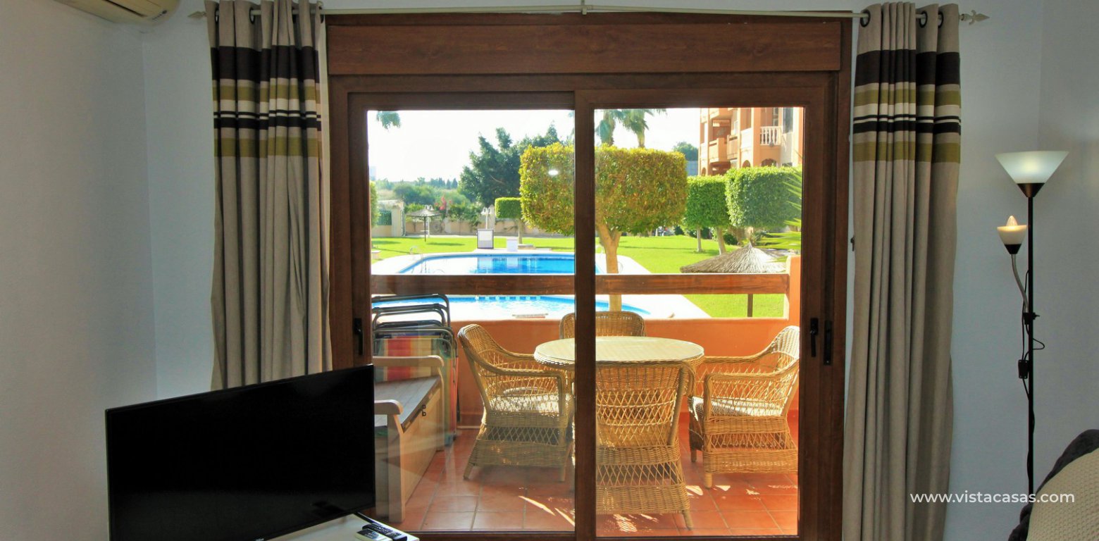 South facing apartment overlooking the pool in Pau 8 Villamartin lounge pool view