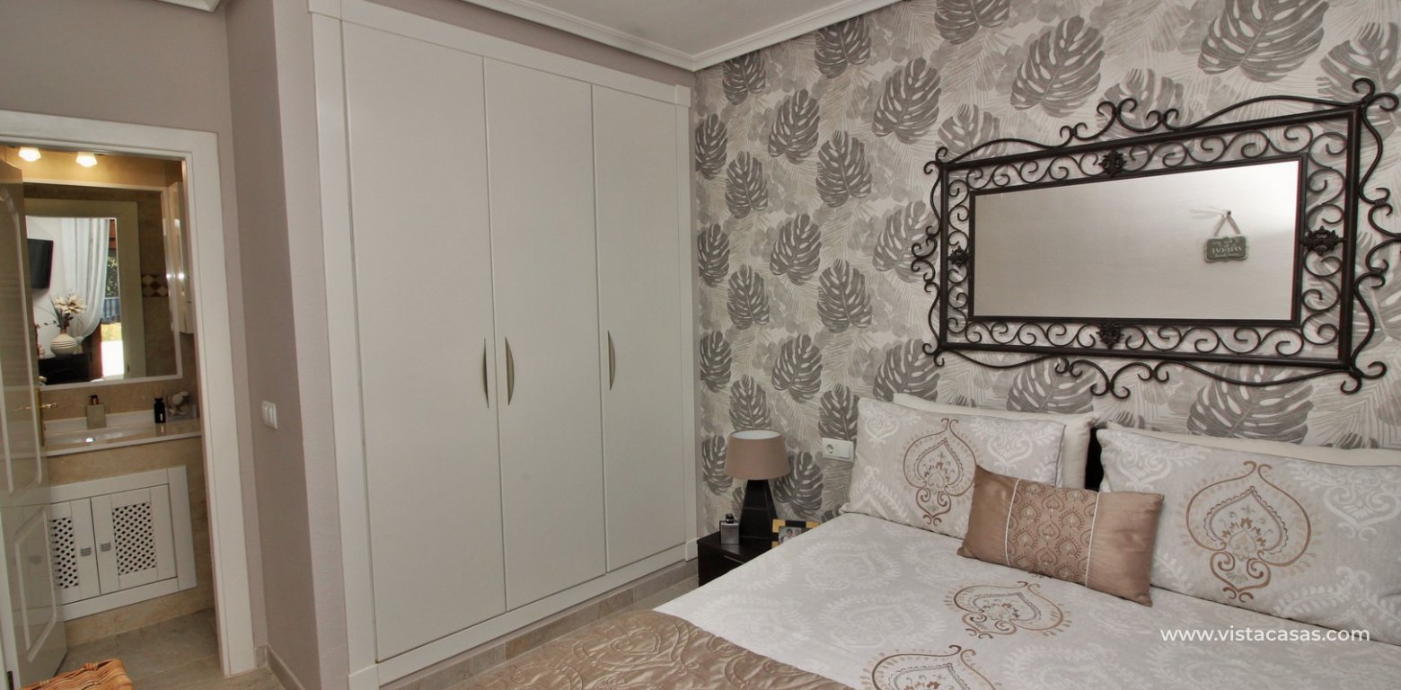 South facing Lola bungalow for sale Pau 8 Villamartin master bedroom fitted wardrobes