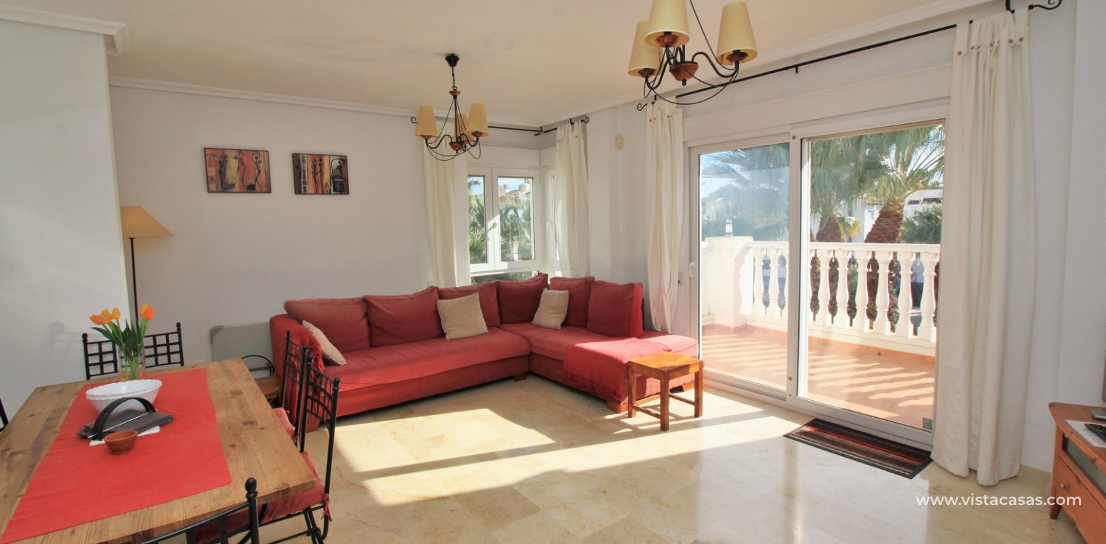 Duplex apartment for sale with golf and pool views Villamartin lounge 3
