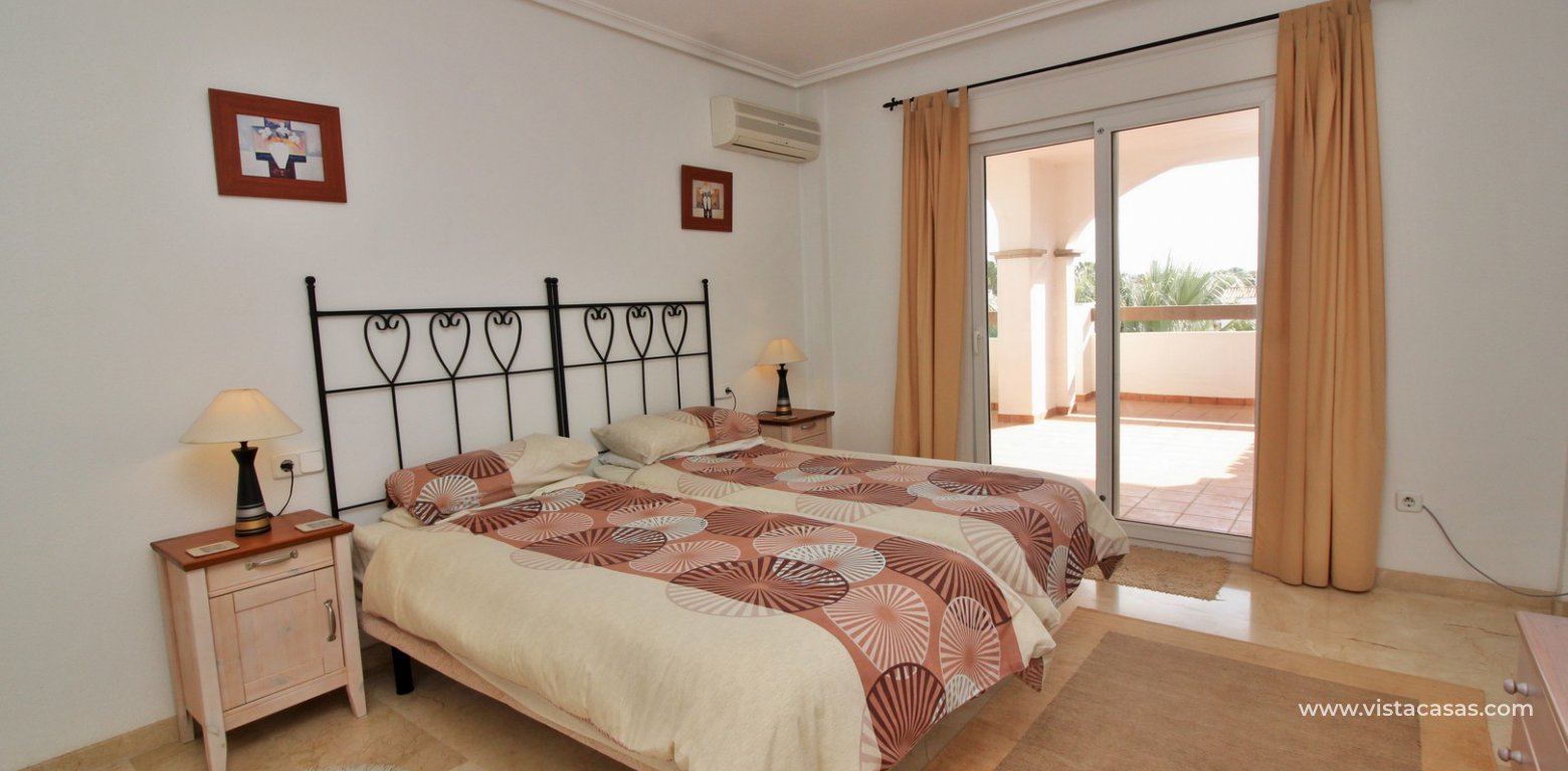 Duplex apartment for sale with golf and pool views Villamartin master bedroom
