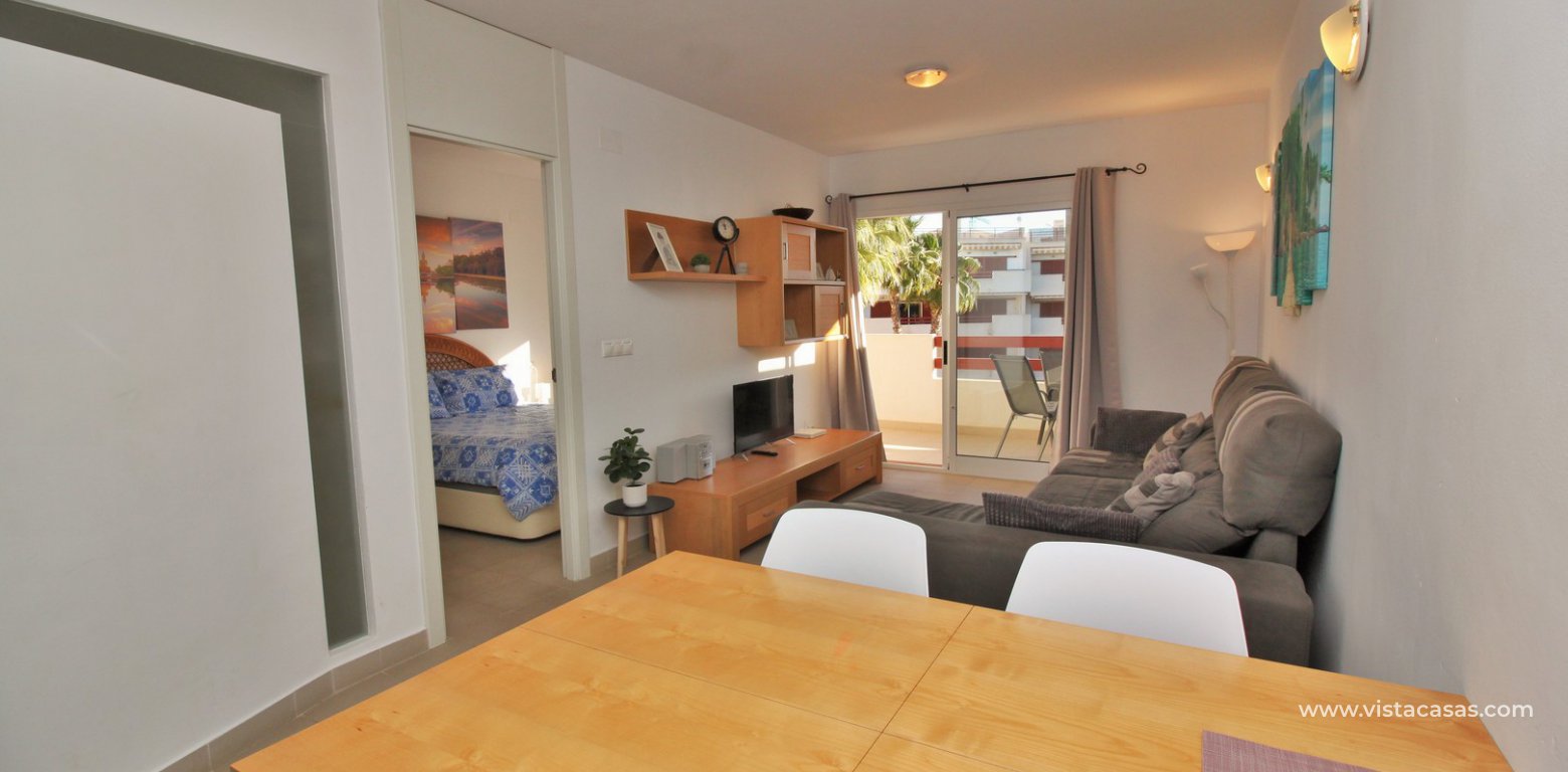 Apartment for sale overlooking the pool El Rincon Playa Flamenca Tourist Licence dining area 2