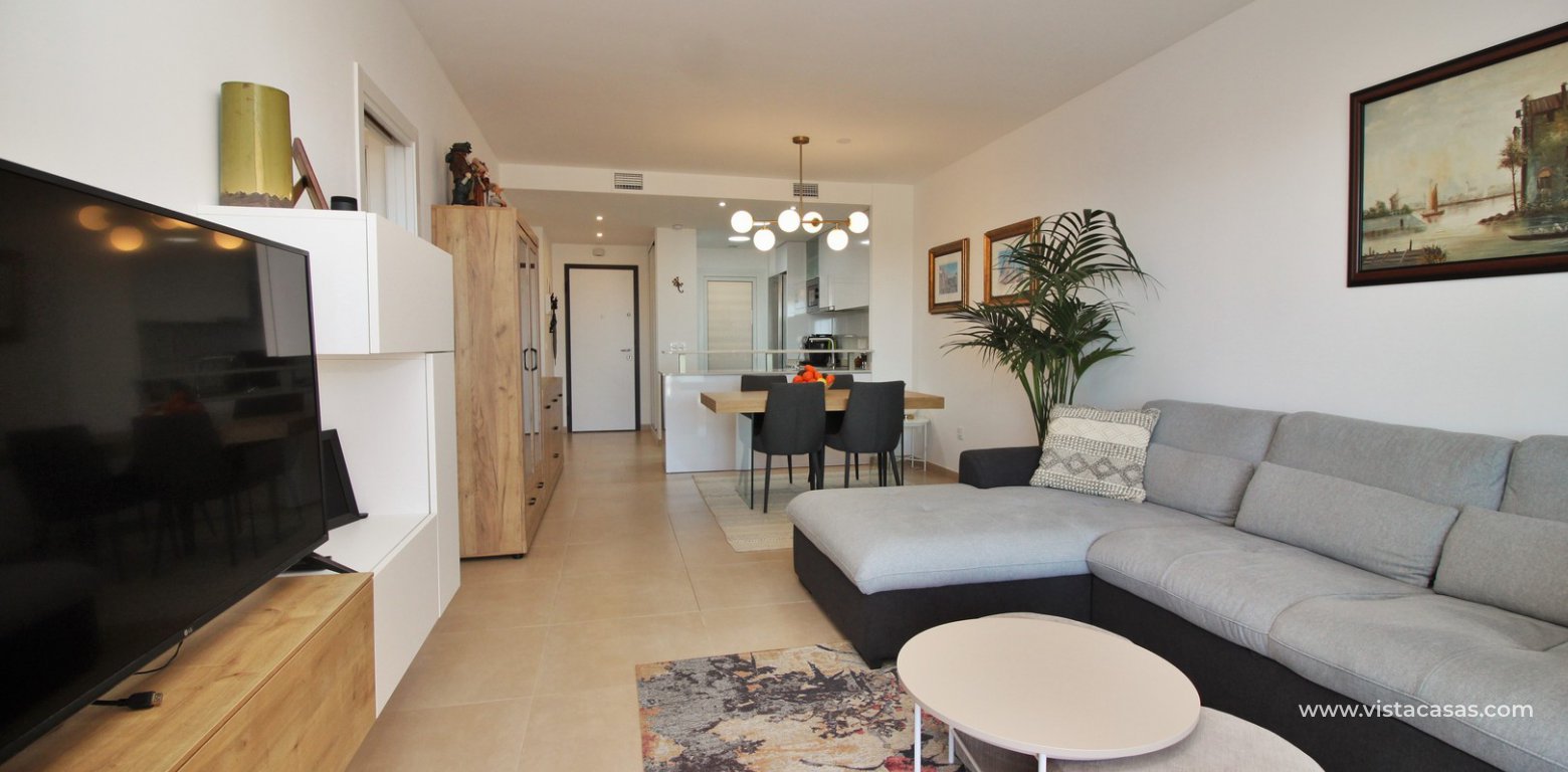 South facing apartment overlooking the pool for sale in Residencial Gala Los Dolses Orihuela Costa lounge