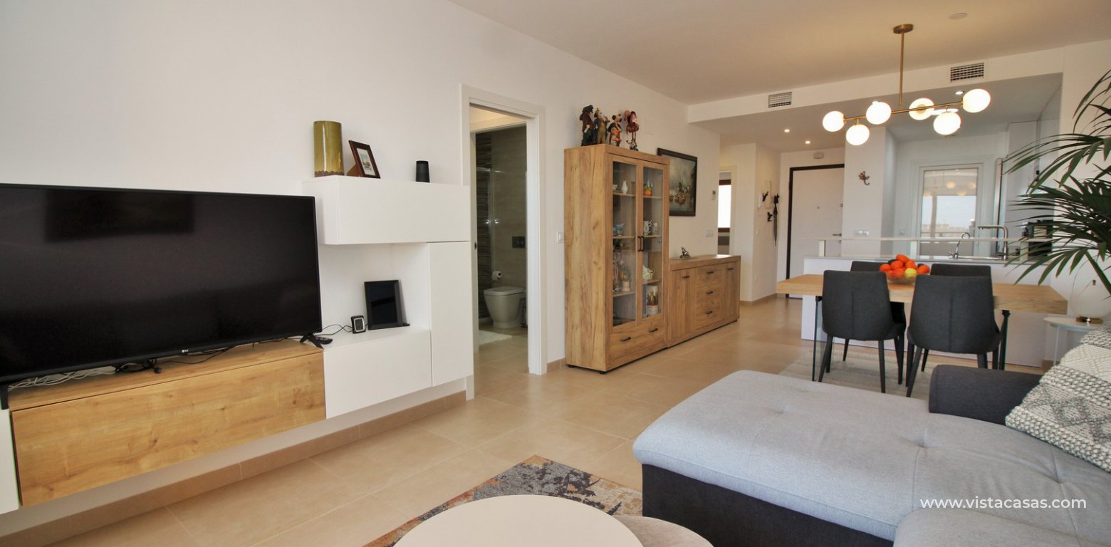 South facing apartment overlooking the pool for sale in Residencial Gala Los Dolses Orihuela Costa lounge 2