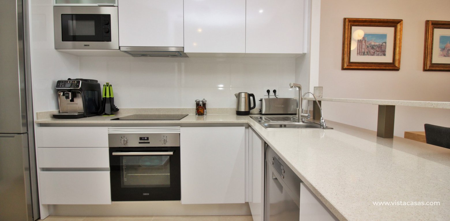 South facing apartment overlooking the pool for sale in Residencial Gala Los Dolses Orihuela Costa kitchen 2