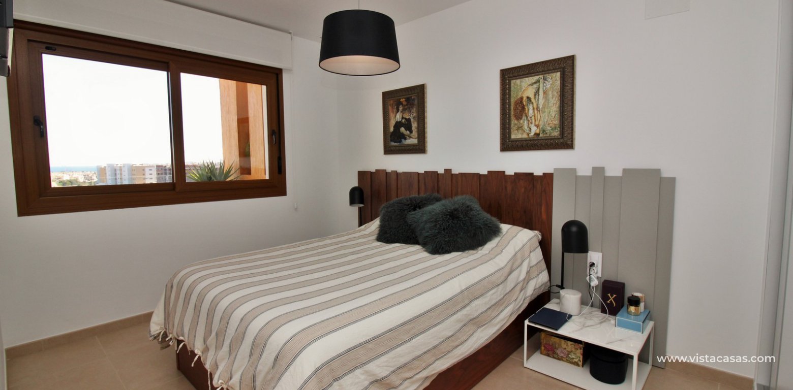 South facing apartment overlooking the pool for sale in Residencial Gala Los Dolses Orihuela Costa master bedroom