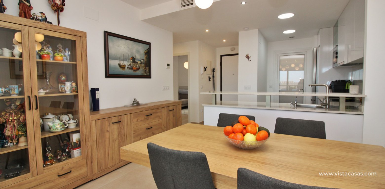 South facing apartment overlooking the pool for sale in Residencial Gala Los Dolses Orihuela Costa dining area 2
