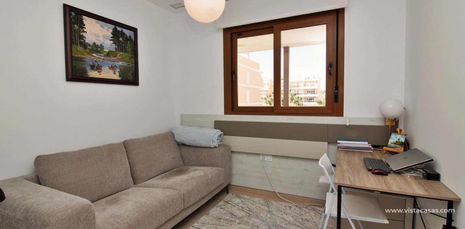 South facing apartment overlooking the pool for sale in Residencial Gala Los Dolses Orihuela Costa twin bedroom