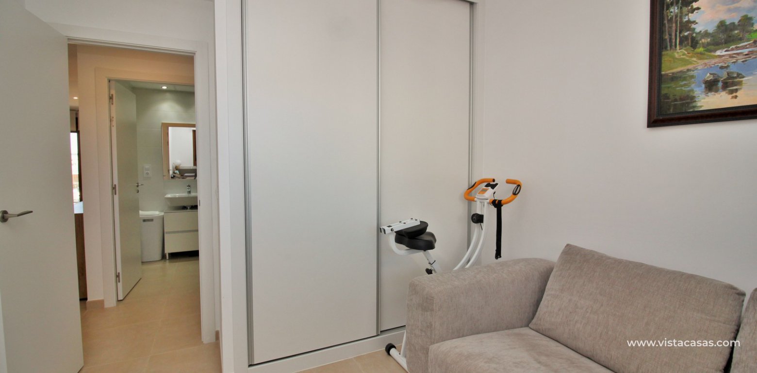 South facing apartment overlooking the pool for sale in Residencial Gala Los Dolses Orihuela Costa twin bedroom fitted wardrobes