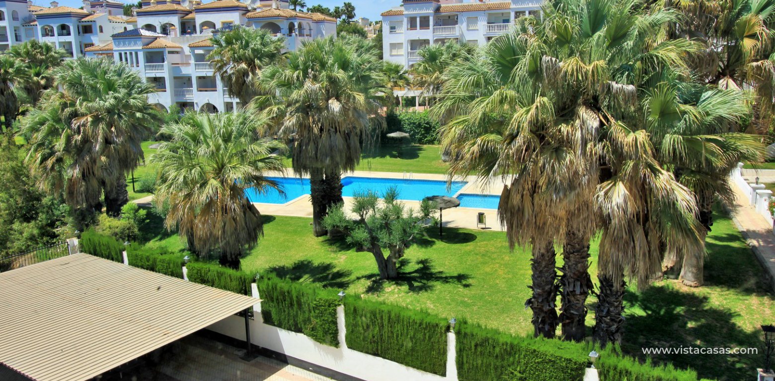 Renovated apartment overlooking the pool for sale in the Villamartin Plaza pool view