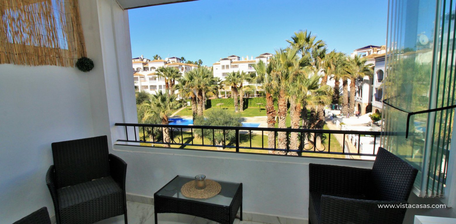 Renovated apartment overlooking the pool for sale in the Villamartin Plaza balcony